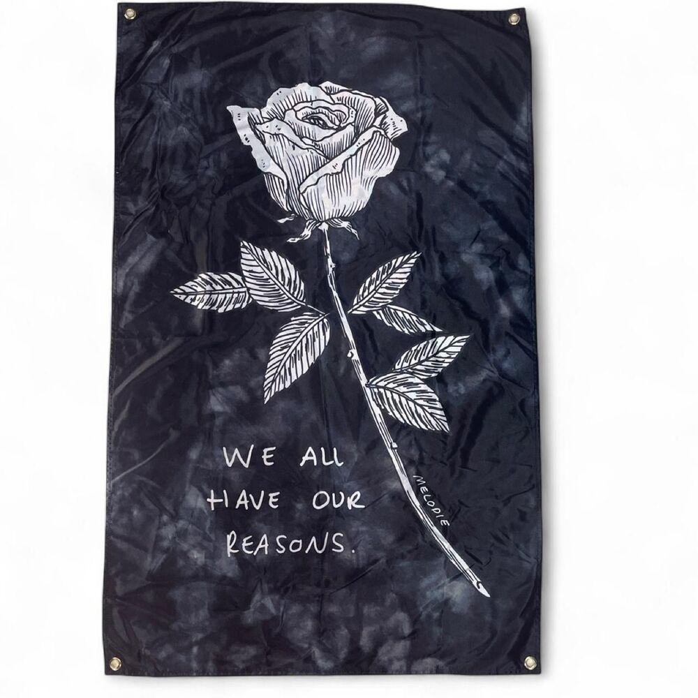 Black & white tie-dye flag with white rose 'WE ALL HAVE OUR REASONS.' 4x3
